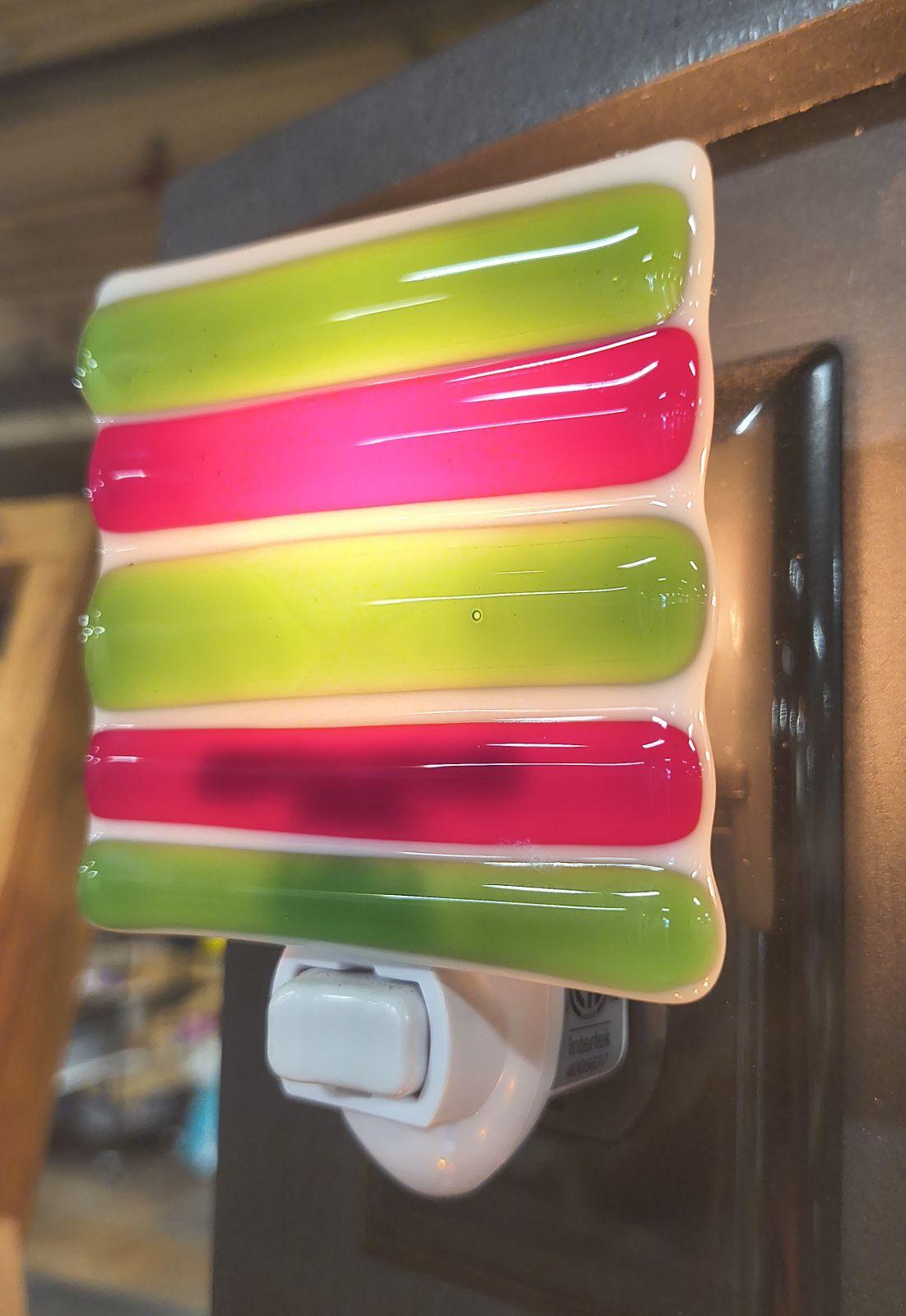 Colorful fused glass nightlight with green and pink stripes handcrafted in Choose Your Own Fusing Project class
