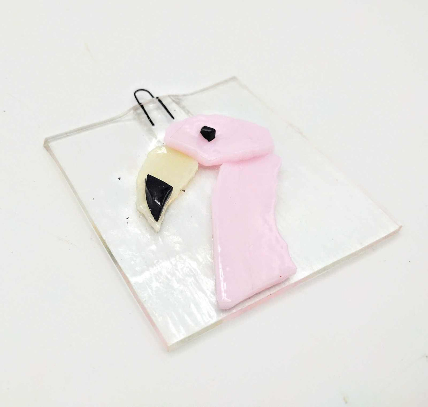Square fused glass piece featuring a pink flamingo design for Choose Your Own Fusing Project class