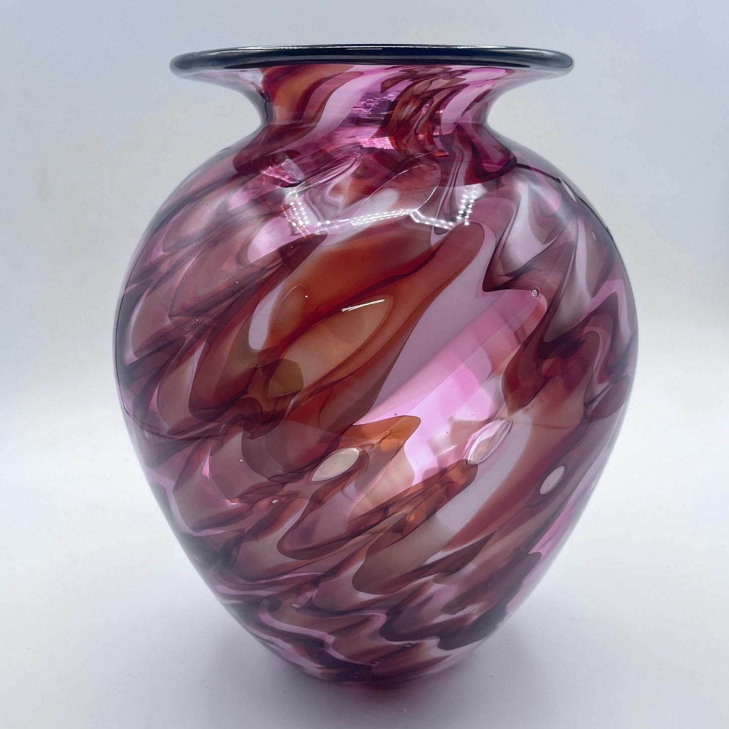 Hand Blown Lava Vase with swirling red and pink glass patterns, handblown art glass decorative piece