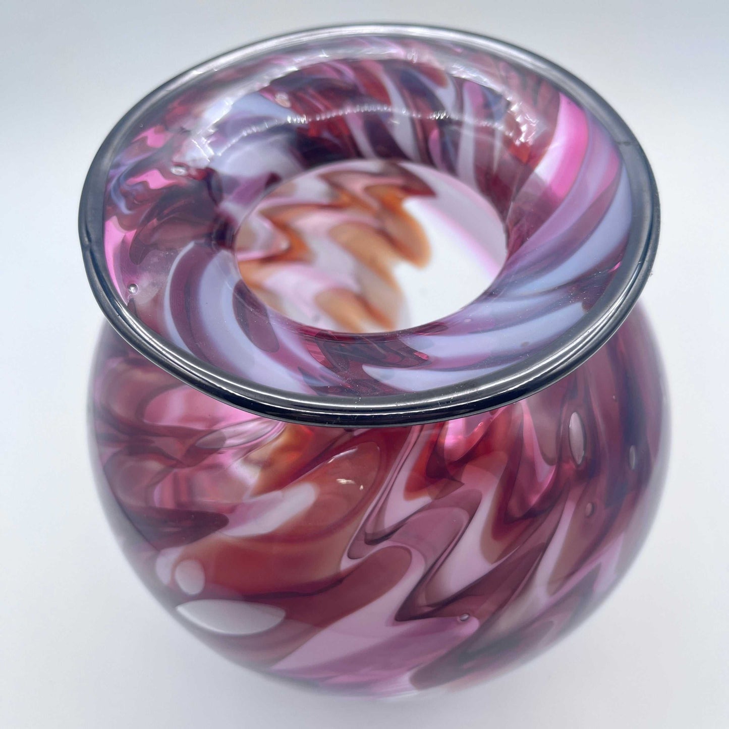 Hand Blown Lava Vase with swirling purple and brown glass patterns, handcrafted and signed, 9x7x5 inches