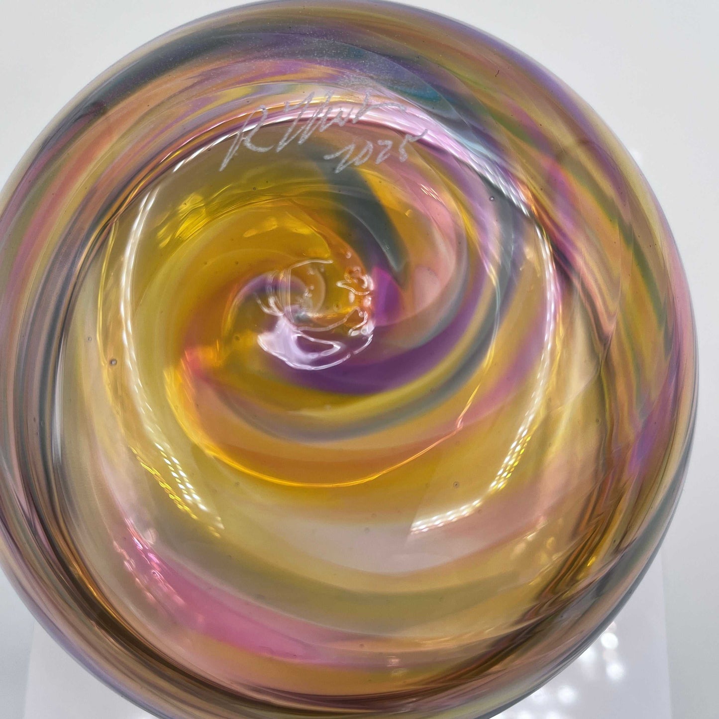 Hand-blown Sunset Twist Serving Bowl with swirling orange, gold, and red gradient colors and organic twisted glass design.