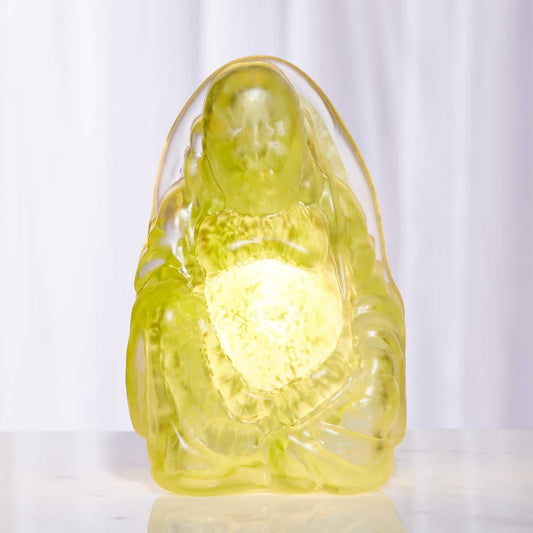 Olive hand blown glass Buddha light with smooth curves and rich olive hue, artisan crafted decorative piece.