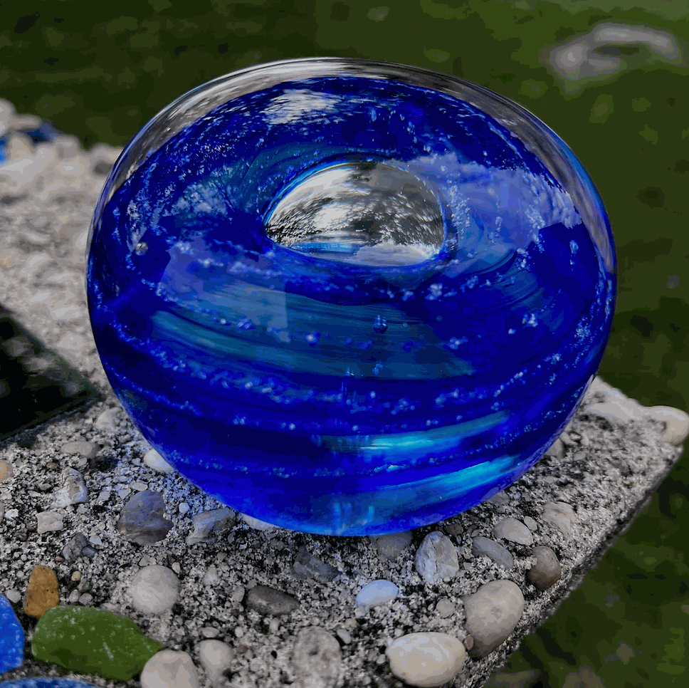 Blue Ashes to Art Glass memorial paperweight orb handcrafted as a cremation keepsake