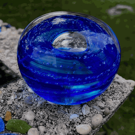 Blue Ashes to Art Glass memorial paperweight orb handcrafted as a cremation keepsake