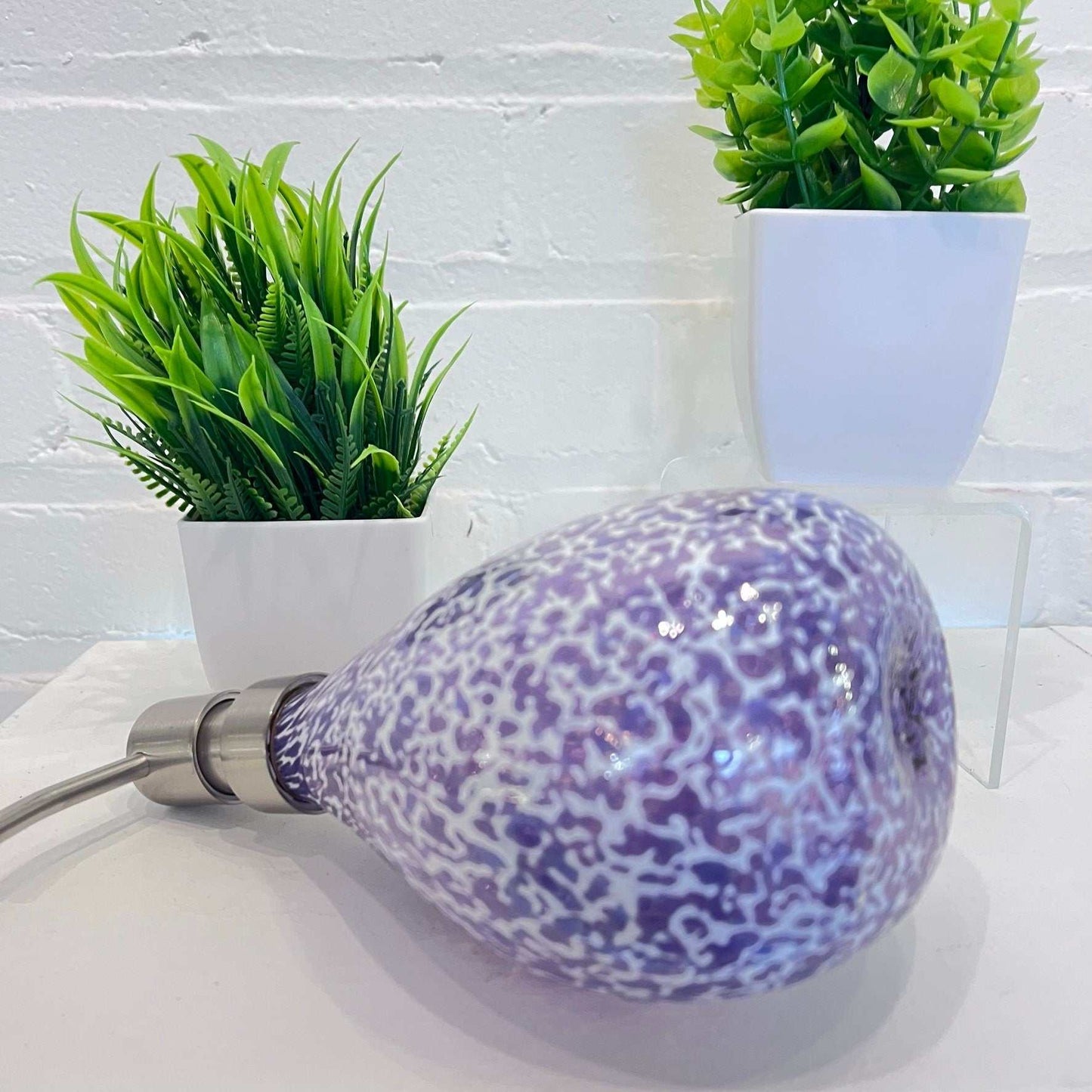 Hyacinth and white riverstone speckled hand blown glass soap dispenser with metal pump and marbled design