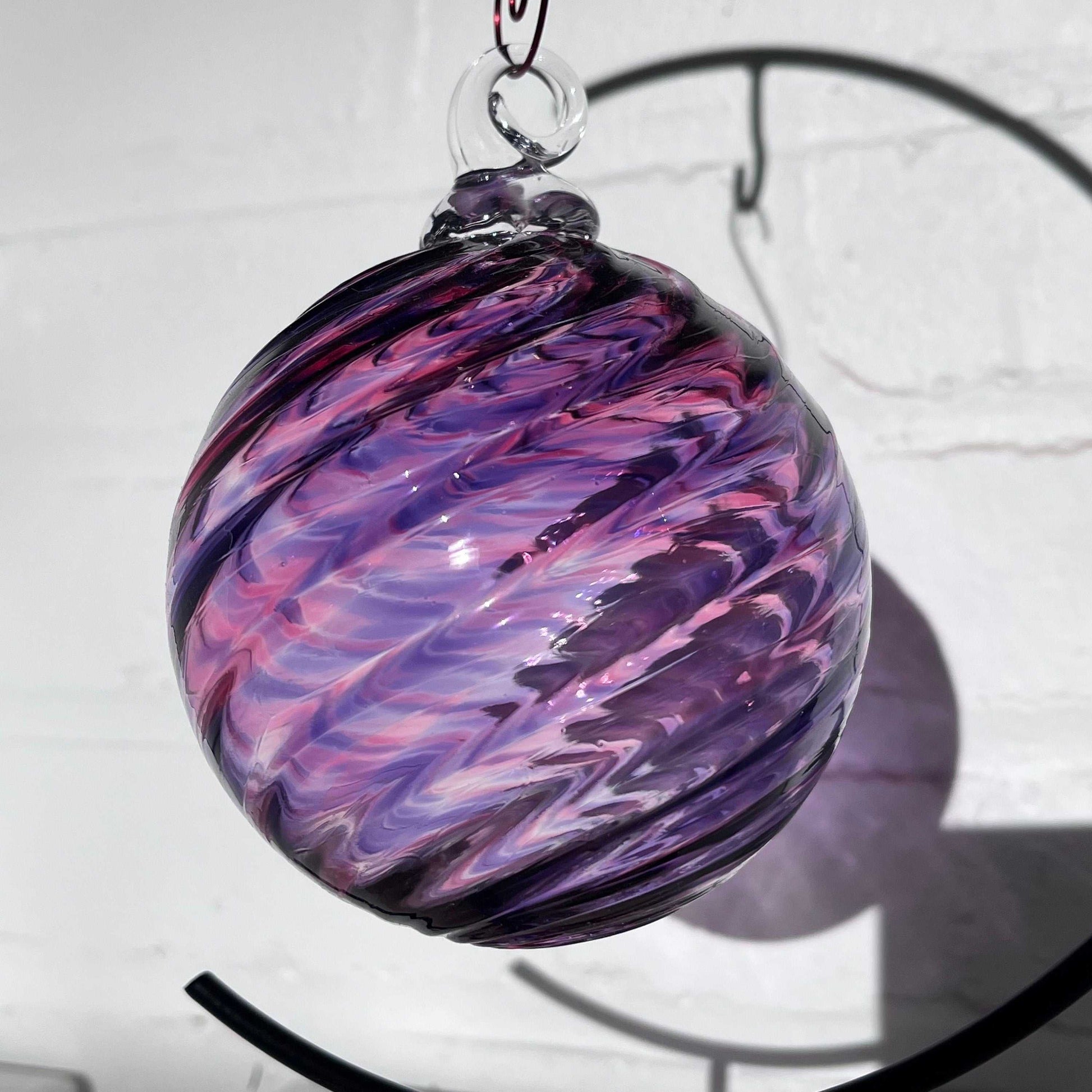 Purple Mix Spiral Twist hand blown glass ornament with a 4x4 inch spiral pattern