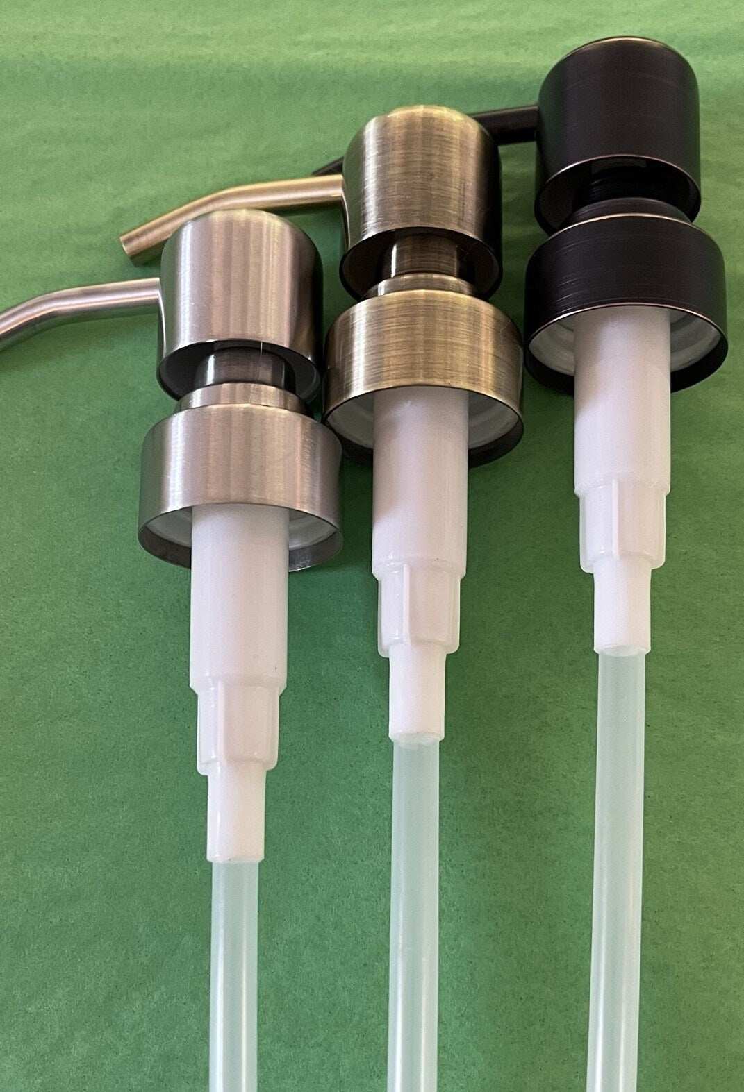 Set of three metal soap dispenser pumps compatible with bright and bold handblown glass soap dispensers