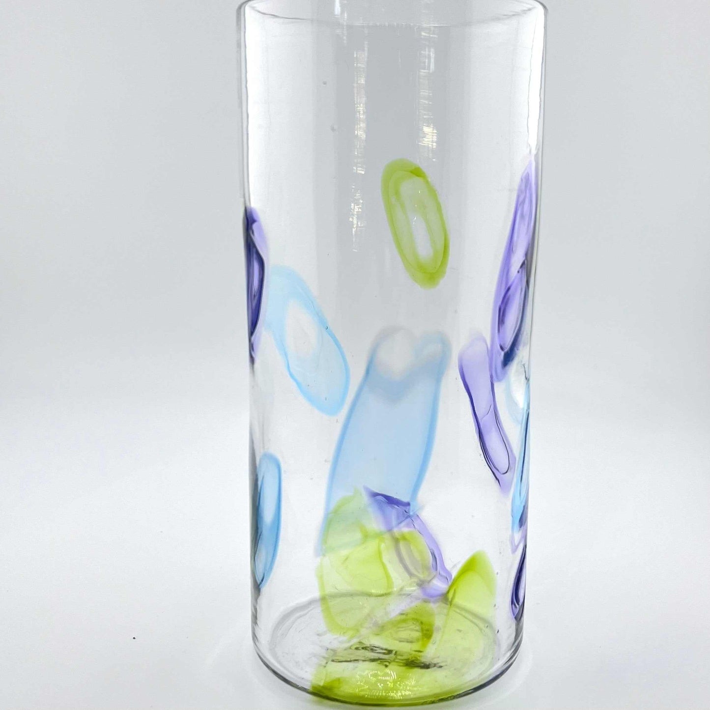 Hand blown high ball glass with colorful citron, hyacinth, and bluestone murrini patterns, part of Super Sassy Set of two glasses