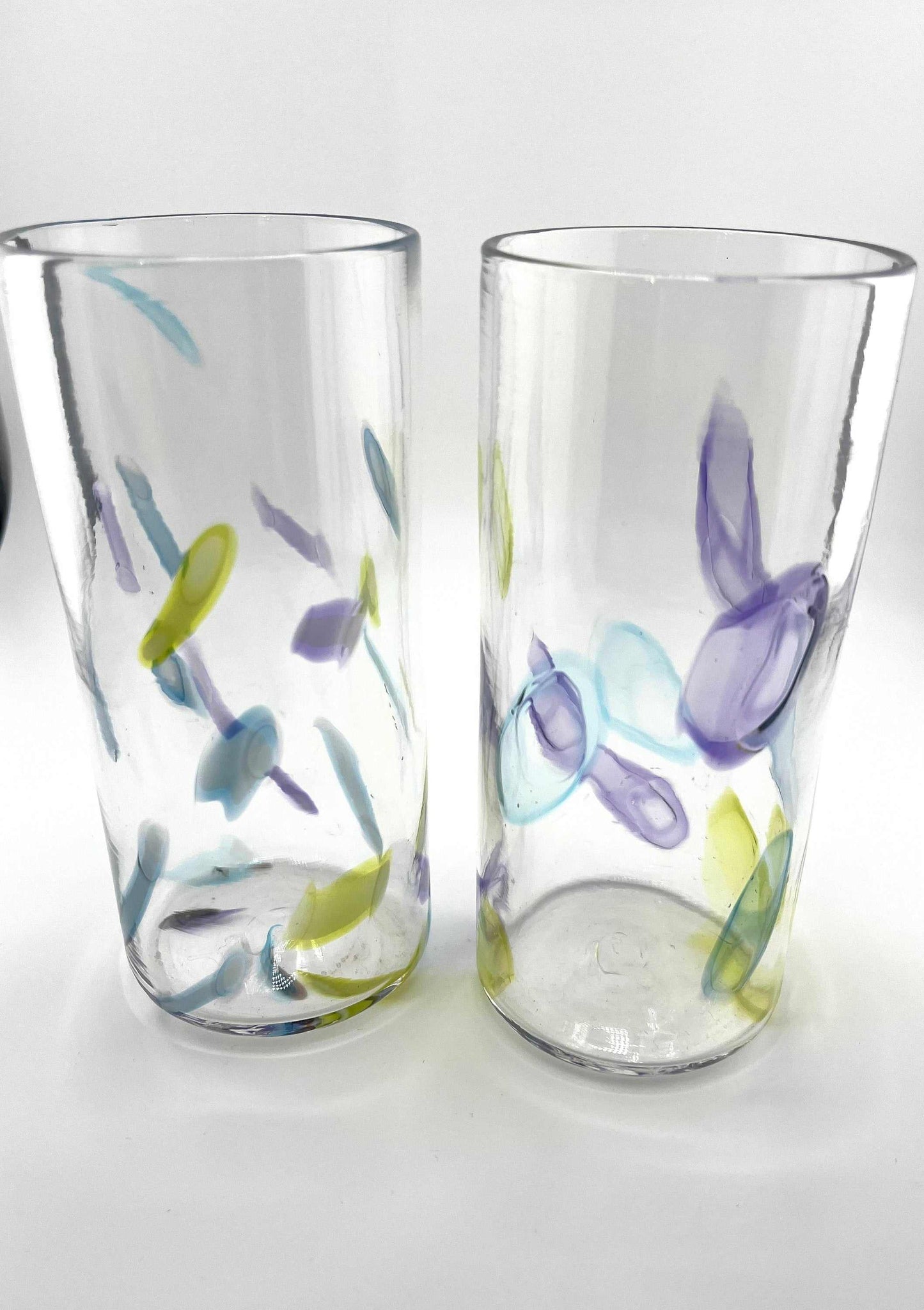 Super Sassy Set of two hand blown high ball glasses with citron, hyacinth, and bluestone murrini designs, dishwasher safe.
