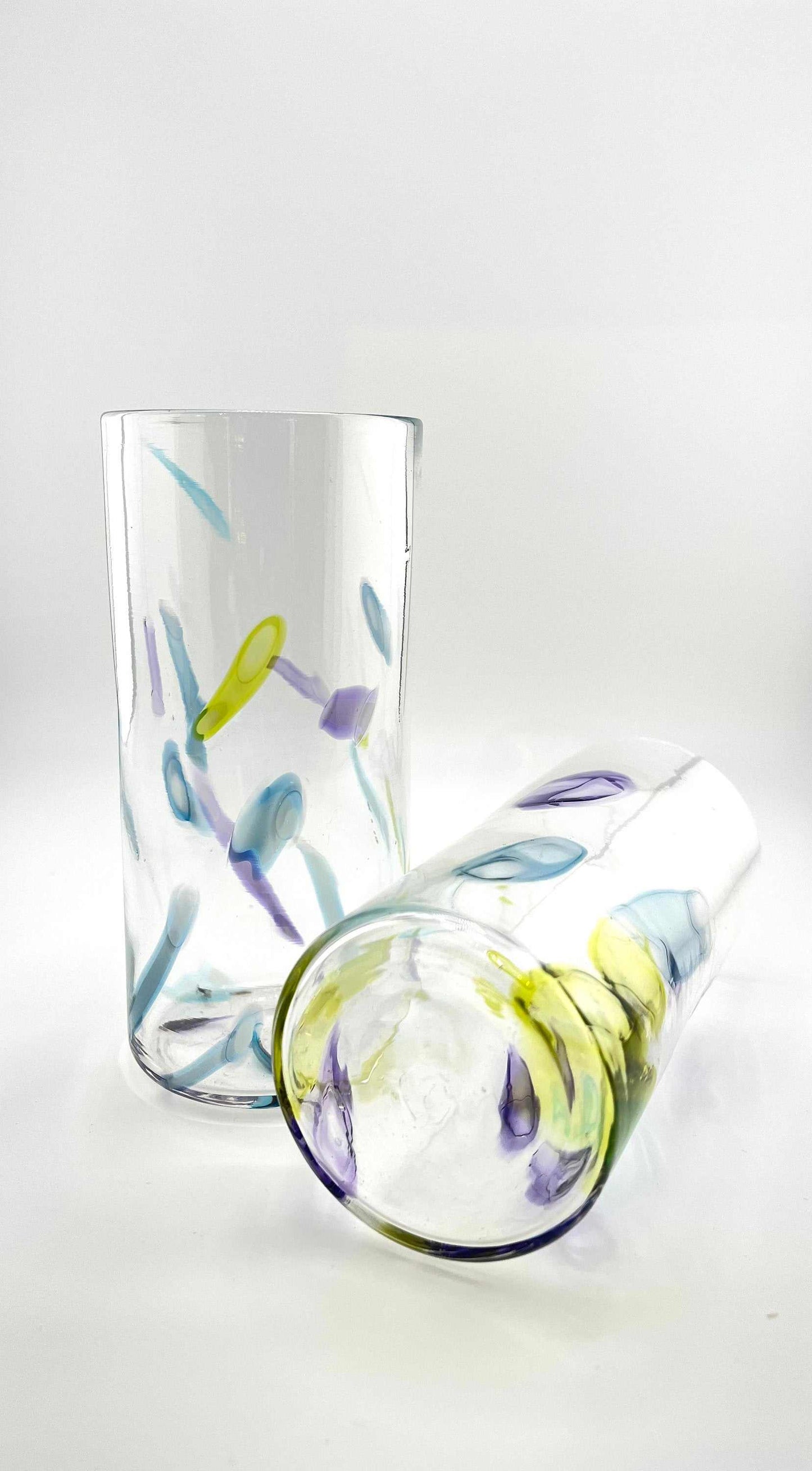 Super Sassy Set of two hand blown high ball glasses with colorful murrini patterns in citron, hyacinth, and bluestone colors