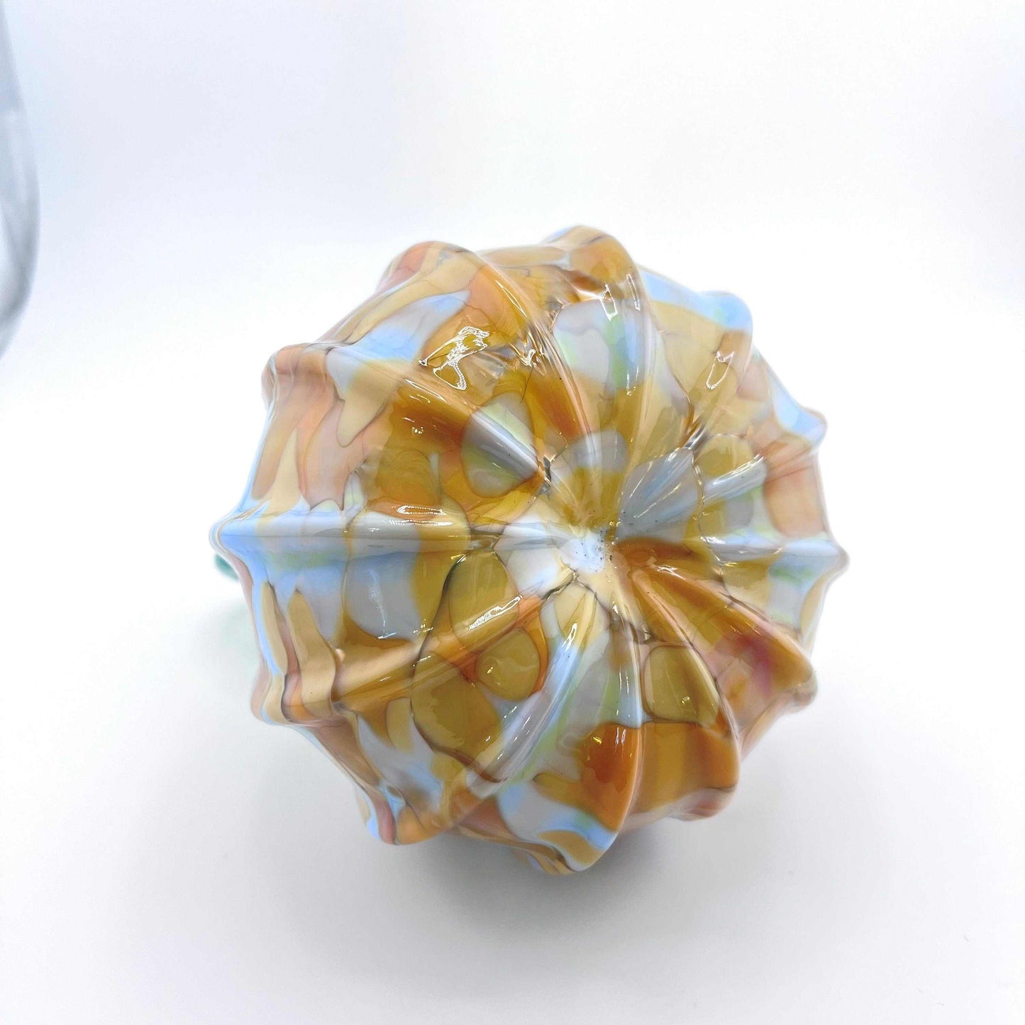 Multicolored hand blown glass pumpkin with curly green stem by Blackstone River Glass Center