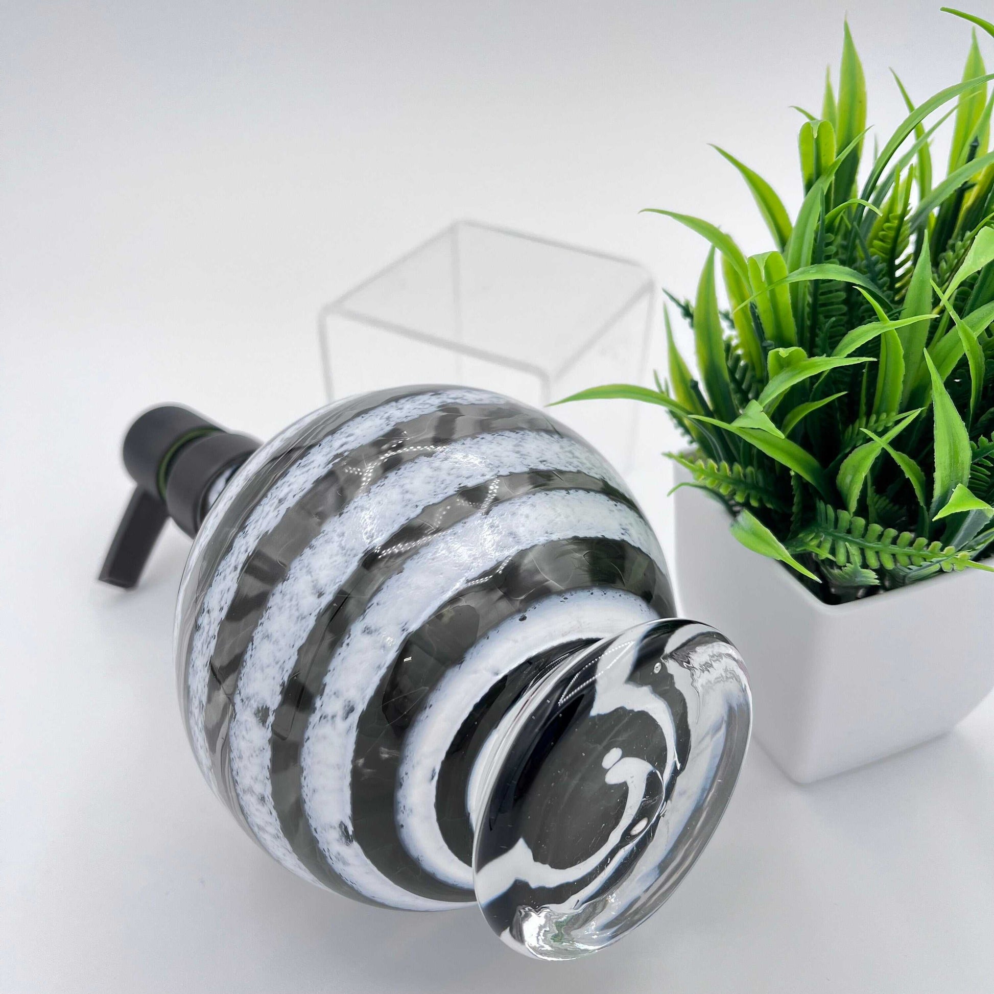 Boho handblown glass soap dispenser in gray with distressed white spiral design and screw-on pump top.