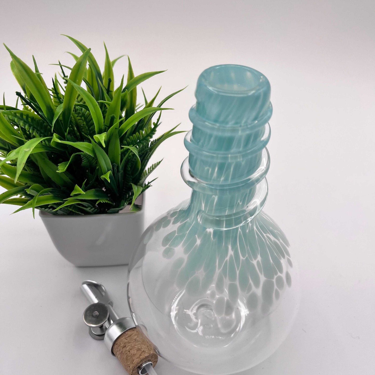 Celadon Oil & Vinegar spiral neck drizzler bottle with weighted pour spout and hand blown glass design