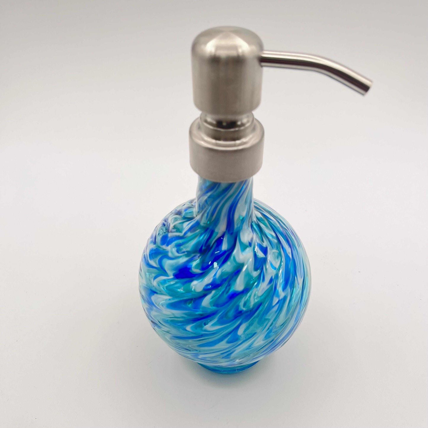 Ocean Mist Blue marbled hand blown glass soap dispenser with stainless steel pump and textured swirled design