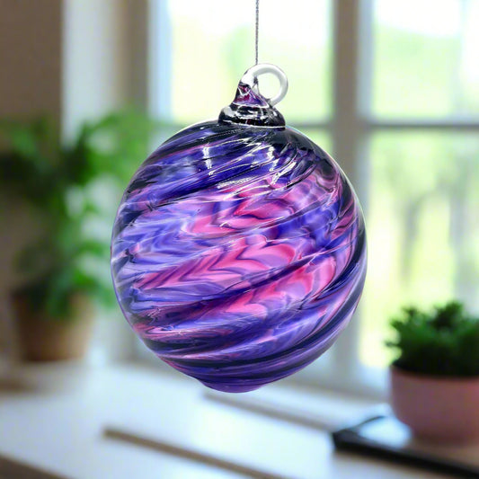 Purple mix spiral twist hand blown glass ornament with swirling purple and pink colors, 4x4 inches, decorative bauble for gifting and holiday decor