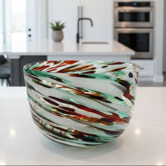 Multicolored glass bowl on a white background