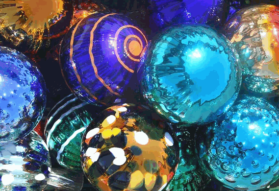 Colorful handmade glass ornaments showcasing unique bubble patterns for Make Your Own Ornament workshop