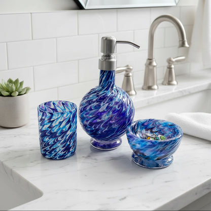 Handmade marbled glass vanity set in hyacinth and aqua with soap dispenser, bowl, and glass