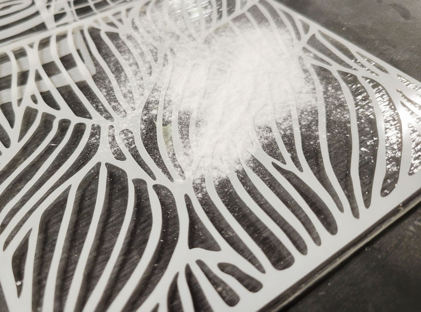 close up stencil powder glass print